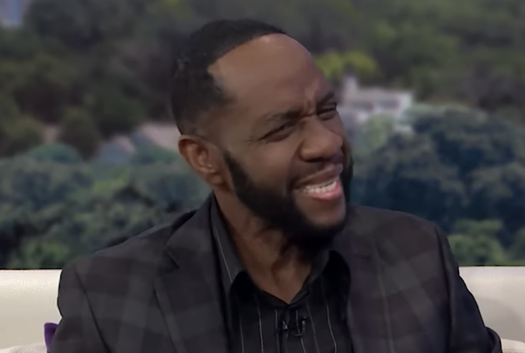 Freddie Jackson smiling during a television interview