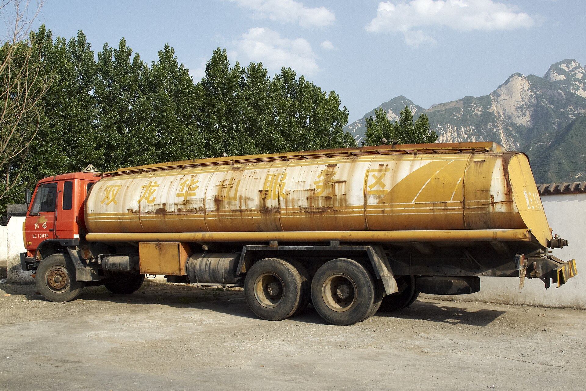 A fuel tank truck on a highway in daylight