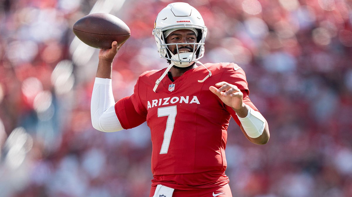 Arizona Cardinals quarterback Jacoby Brissett drops back to pass.