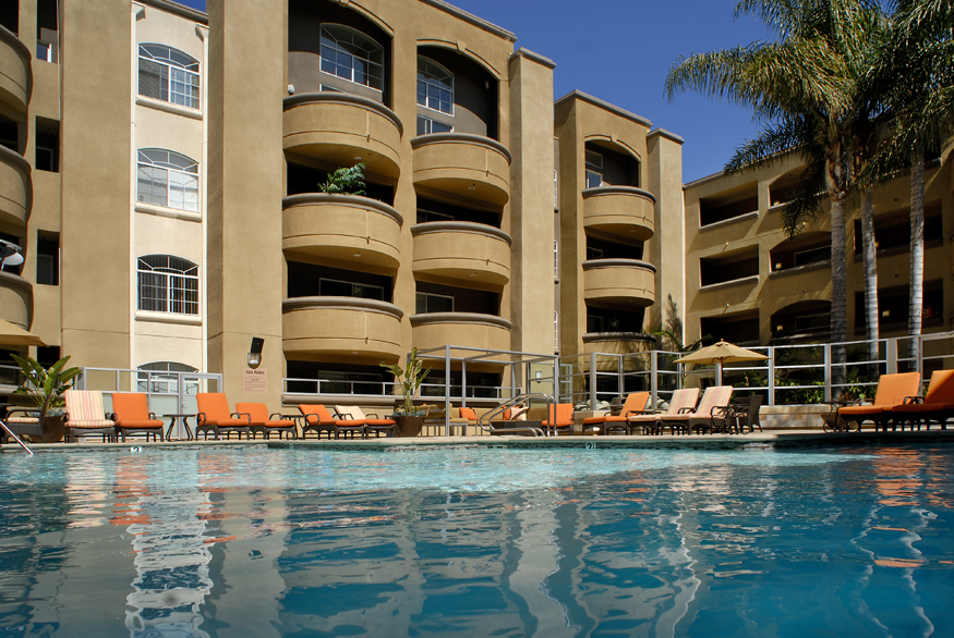 A generic apartment building exterior on a sunny day