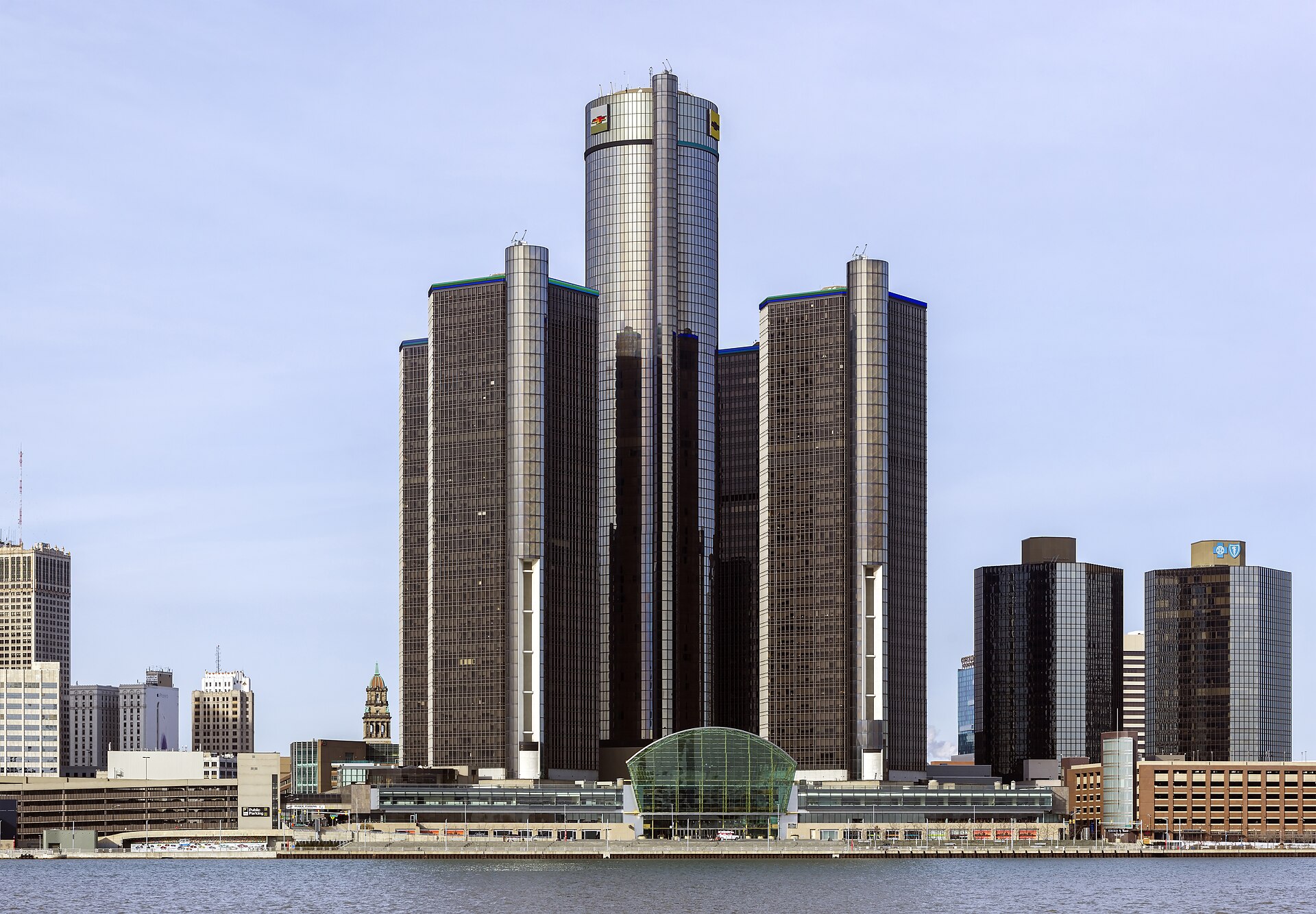The Renaissance Center in Detroit, General Motors' headquarters, seen from across the river on a bright day