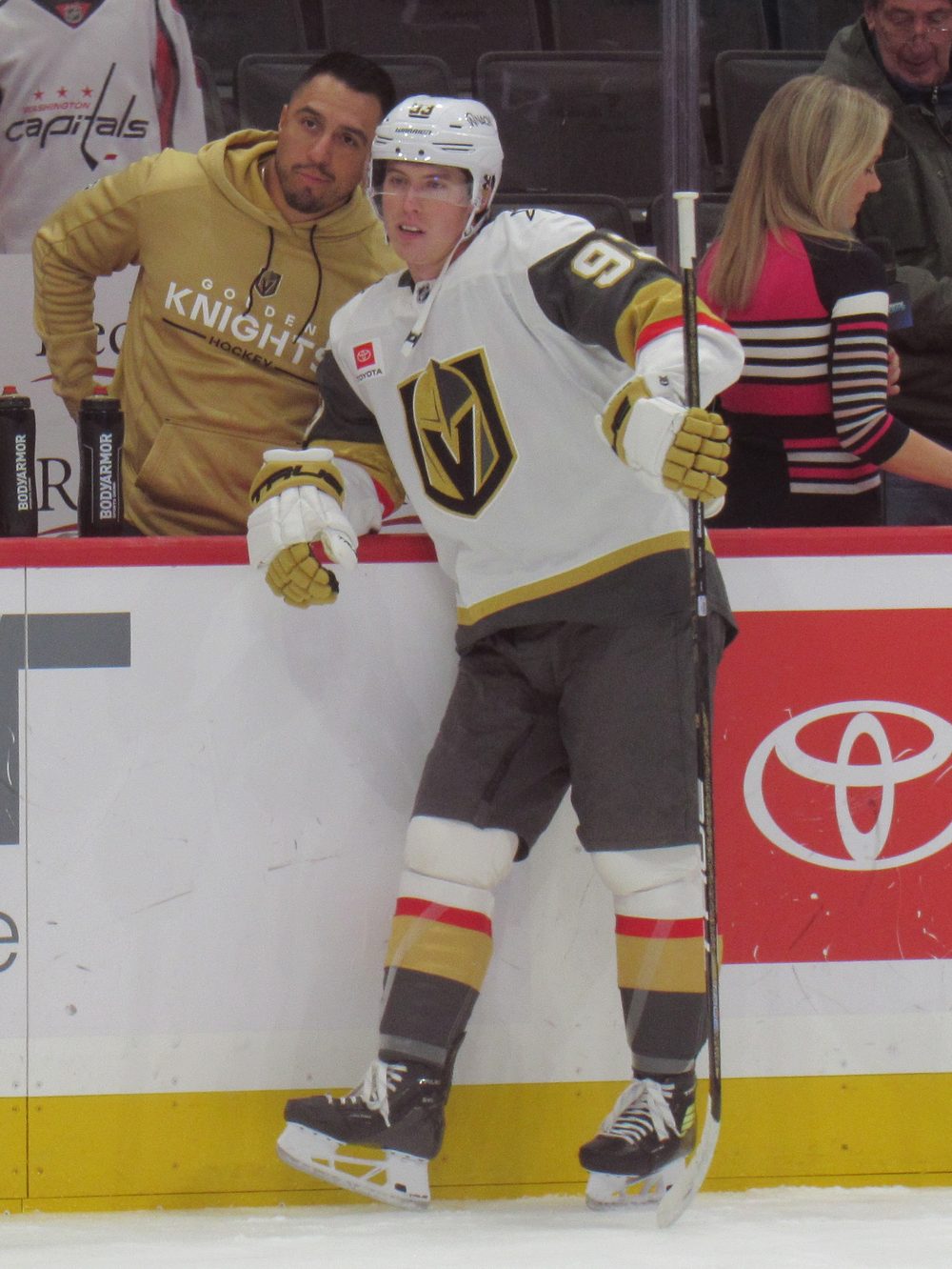 A Vegas Golden Knights player at the boards during a game