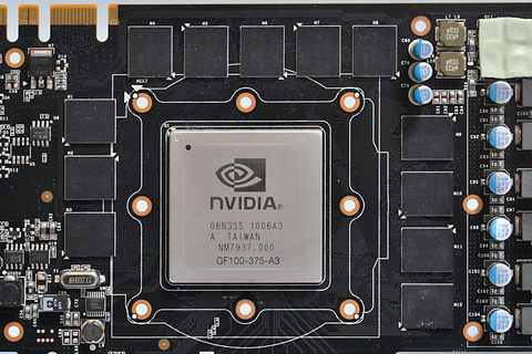 A close-up of a Nvidia GPU processor on a graphics card circuit board