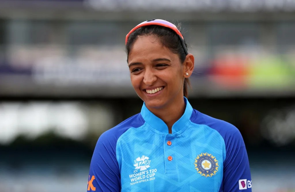 Harmanpreet Kaur smiling in the India jersey during the ICC Women's T20 World Cup