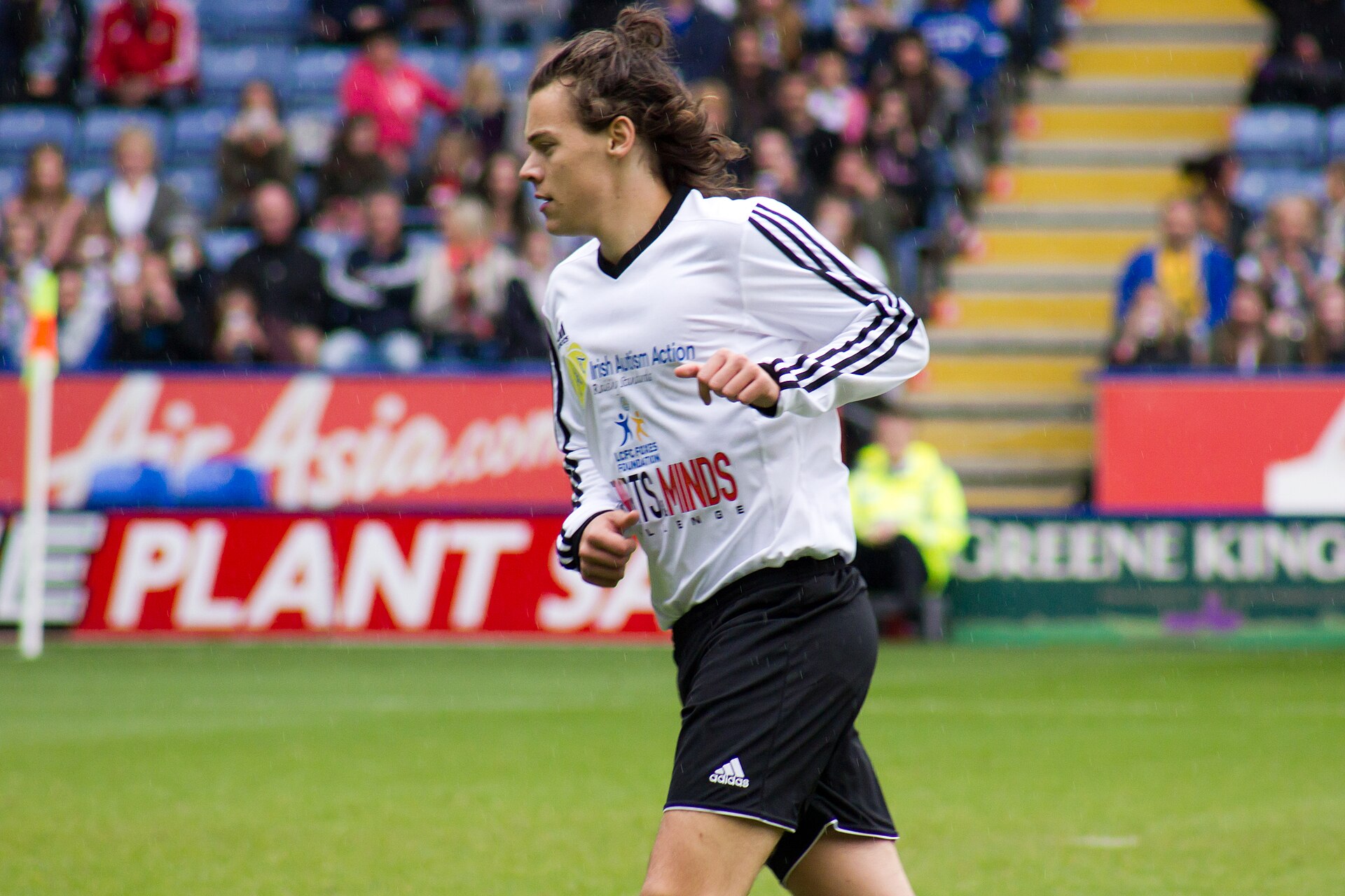 Harry Styles performing