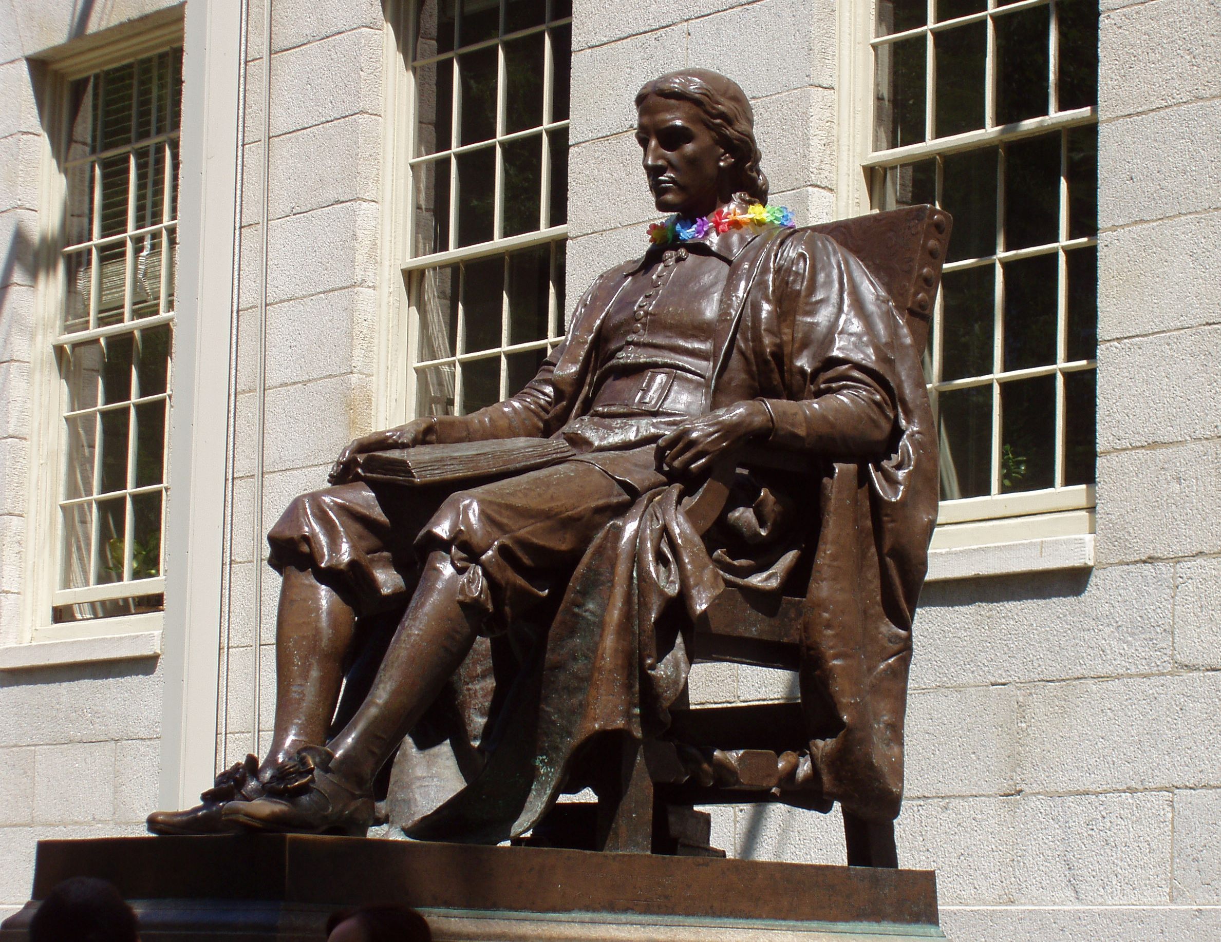 The John Harvard statue on the Harvard campus