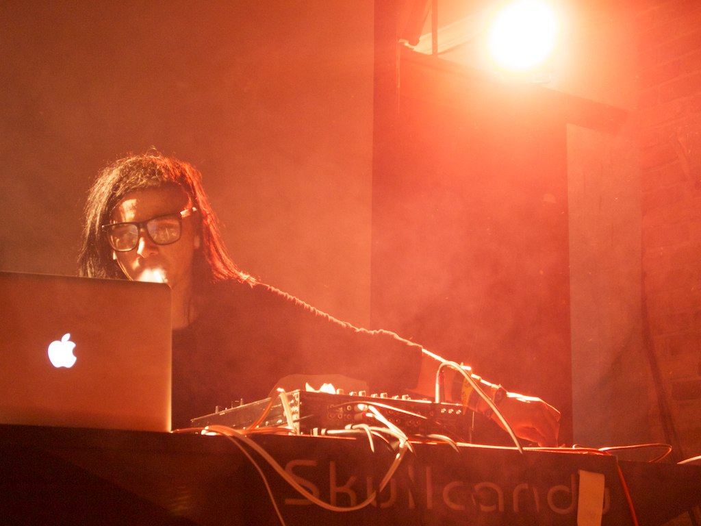 Skrillex performing at the decks