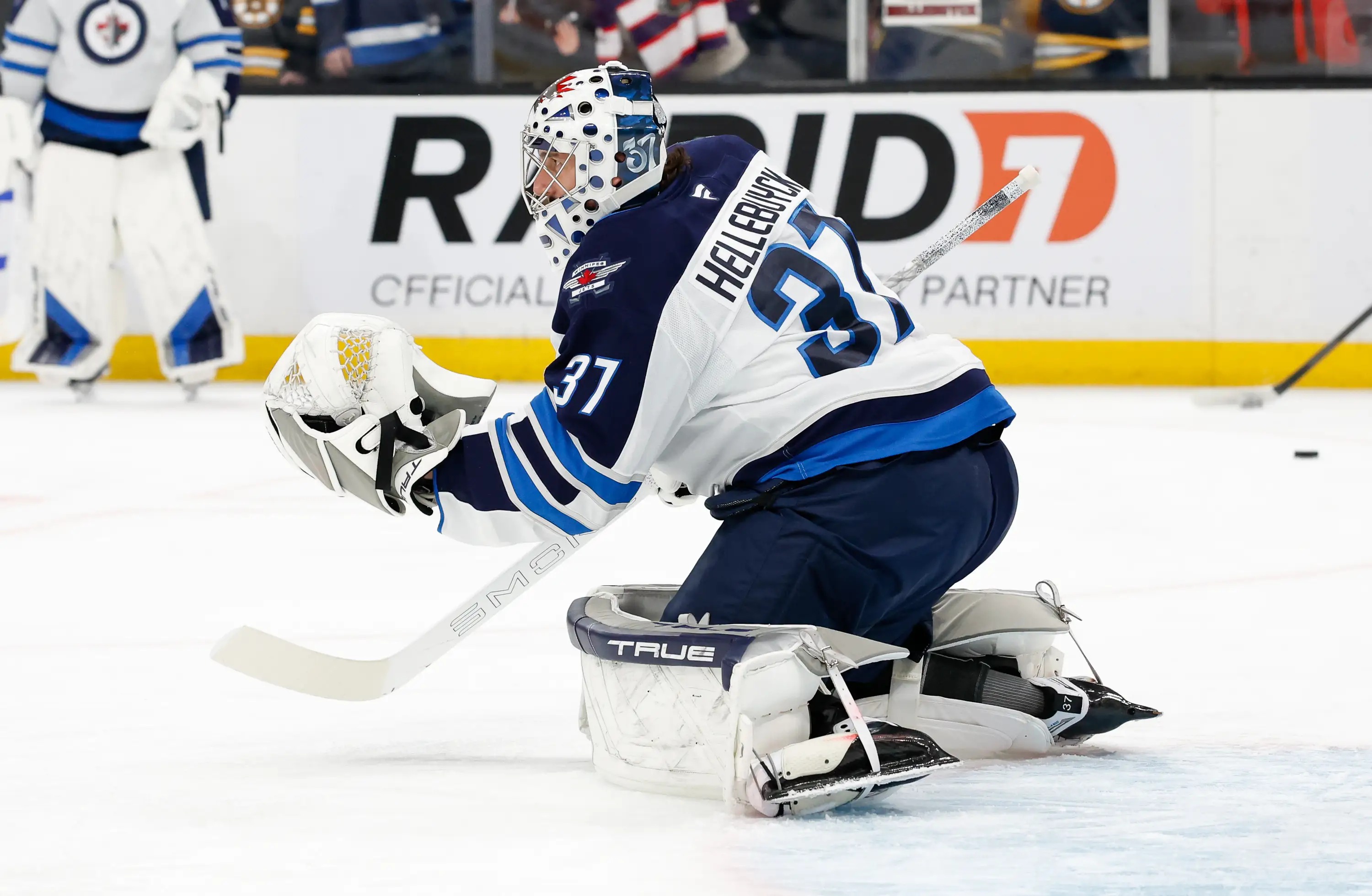 Winnipeg Jets goaltender Connor Hellebuyck in the crease.