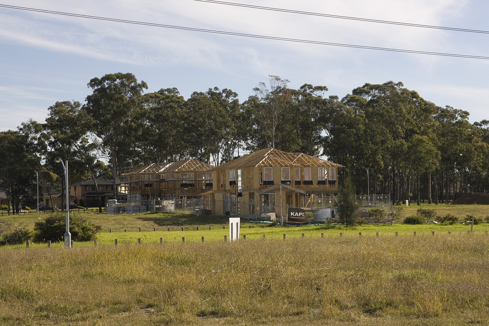 A new home under construction, framed and roofed (file photo)