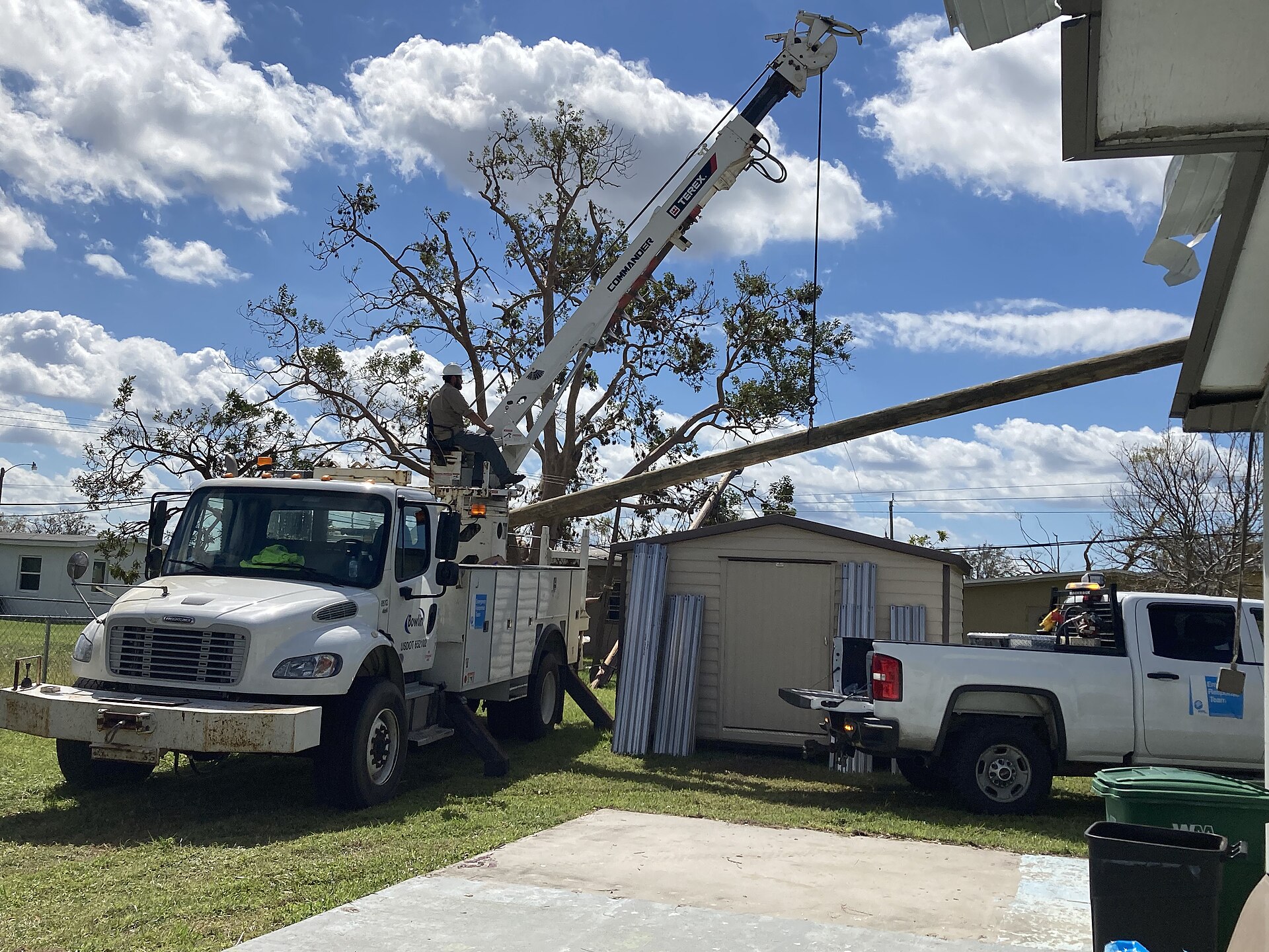 Utility crews restoring power in Florida after a hurricane