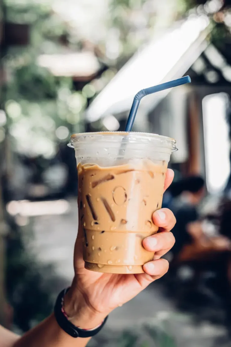 An iced coffee with ice cubes