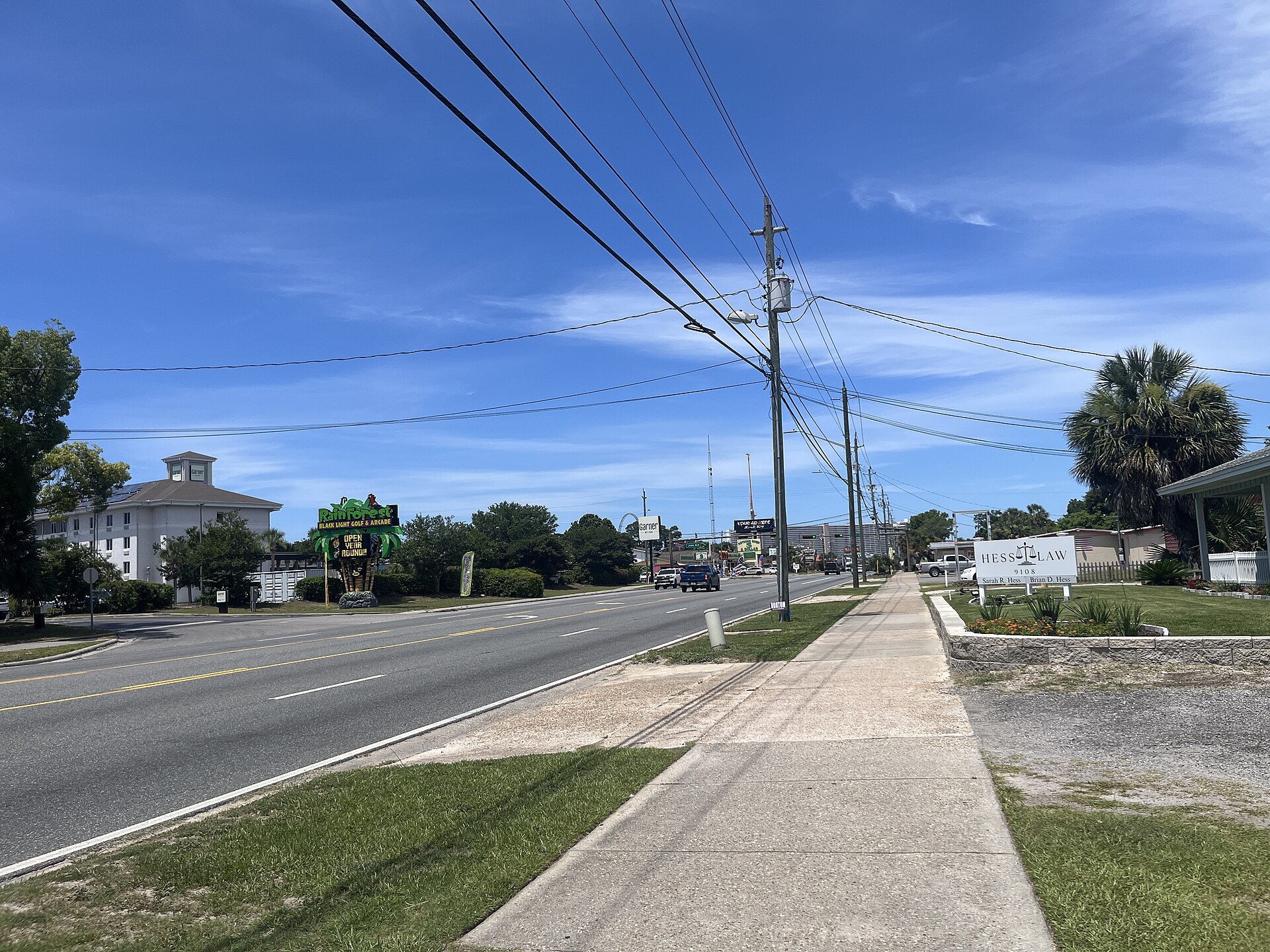 A sunny Panama City Beach street; the city sits inside the hurricane watch zone from Bay St. Louis to Indian Pass