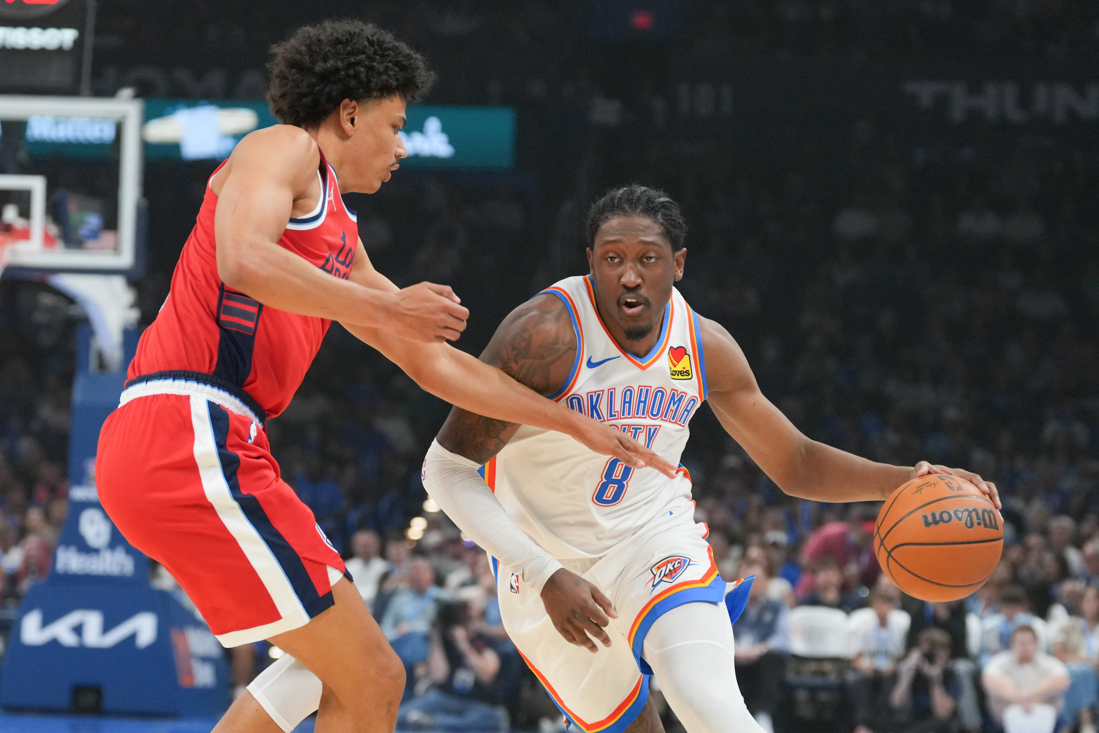 Jalen Williams of the Oklahoma City Thunder drives past the Clippers’ Keaton Wagler during the first half at Paycom Center