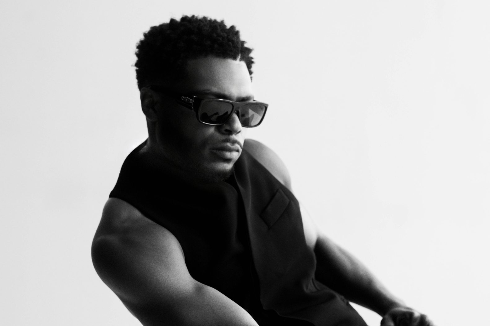 Jawan, the R&B singer formerly known as Jawan Harris, in a press portrait wearing shades