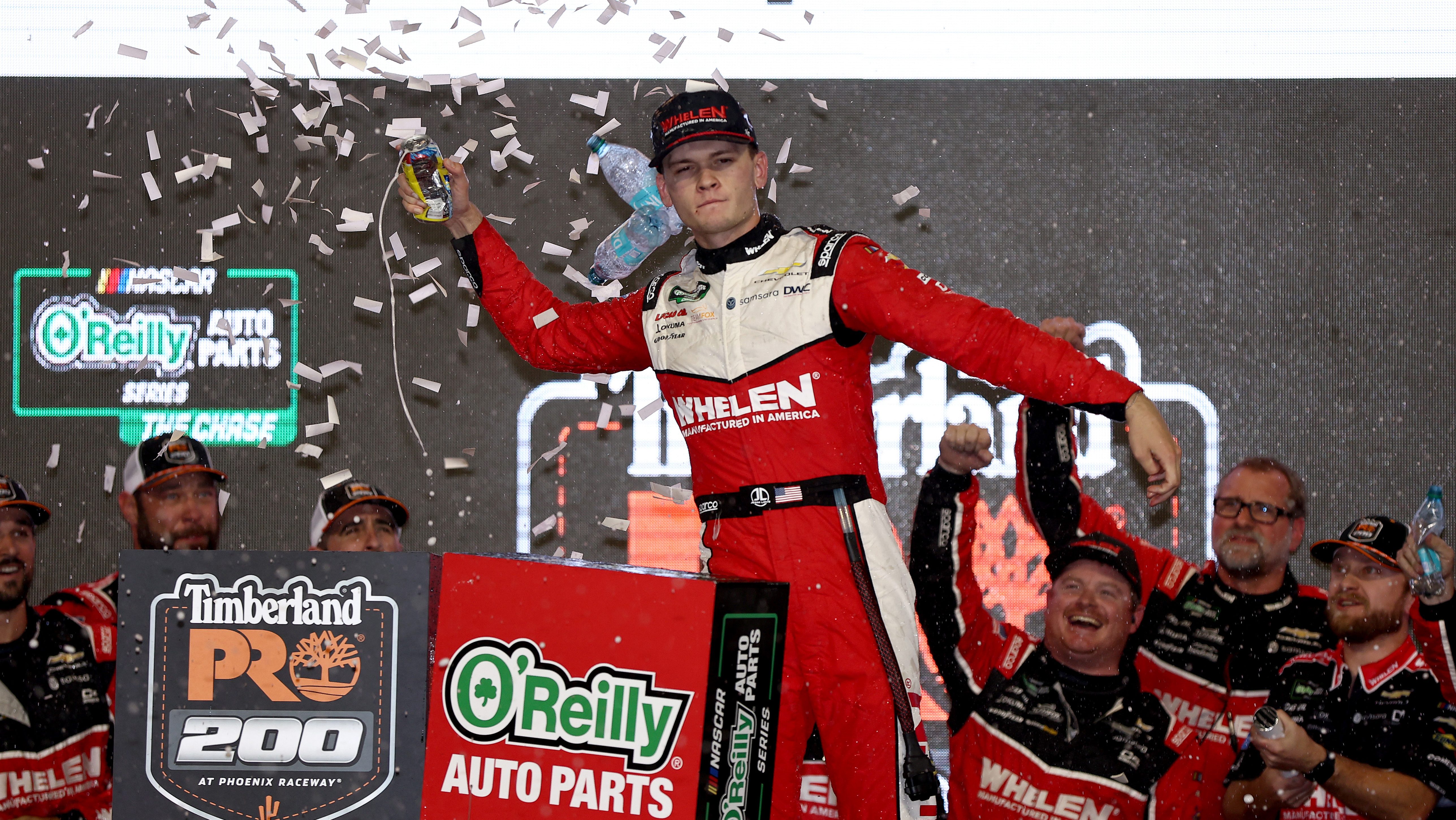 Jesse Love celebrates in victory lane after winning the Timberland PRO 200 at Phoenix Raceway