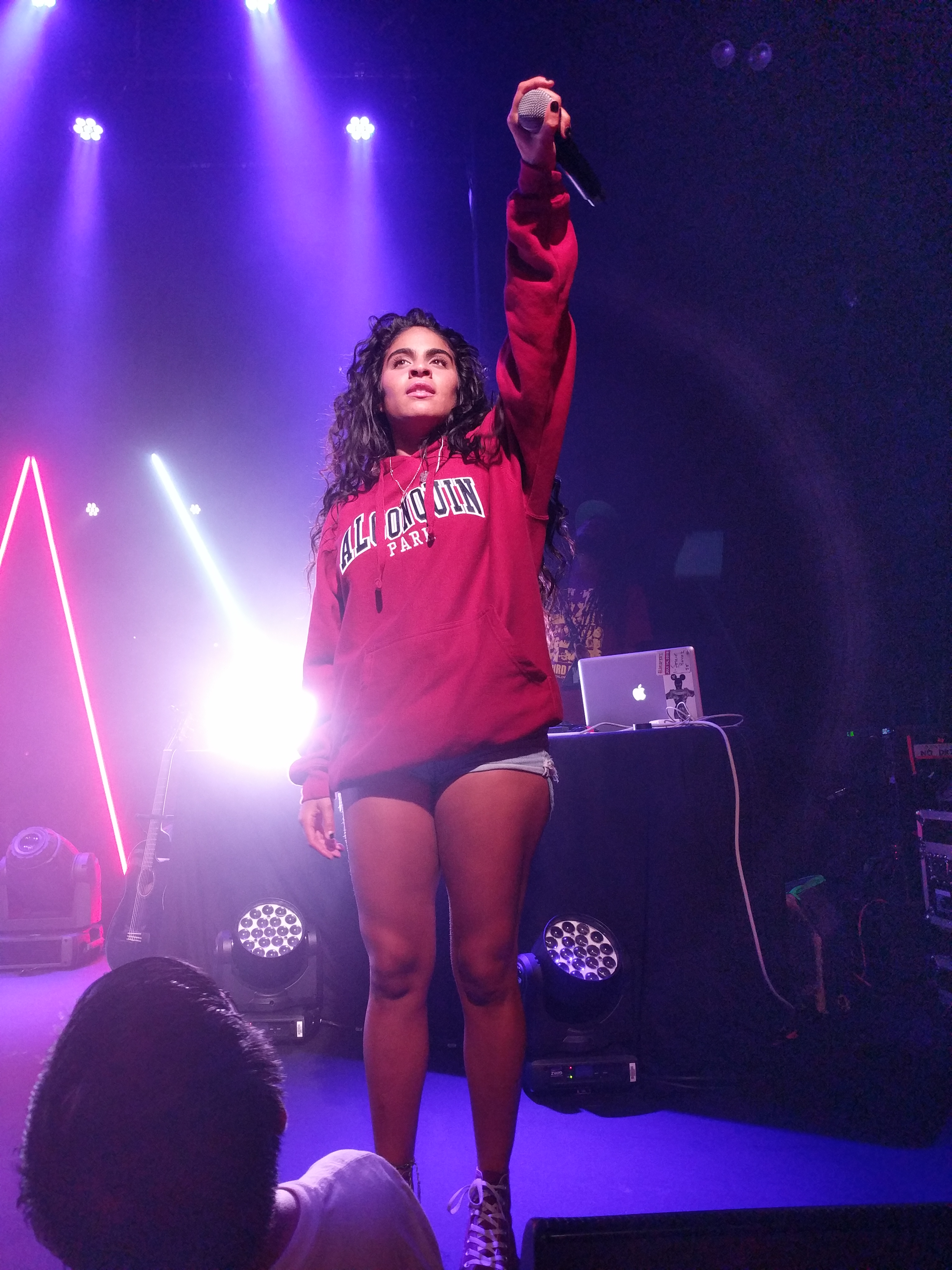 Jessie Reyez speaking on stage at the Collision conference in Toronto in 2019