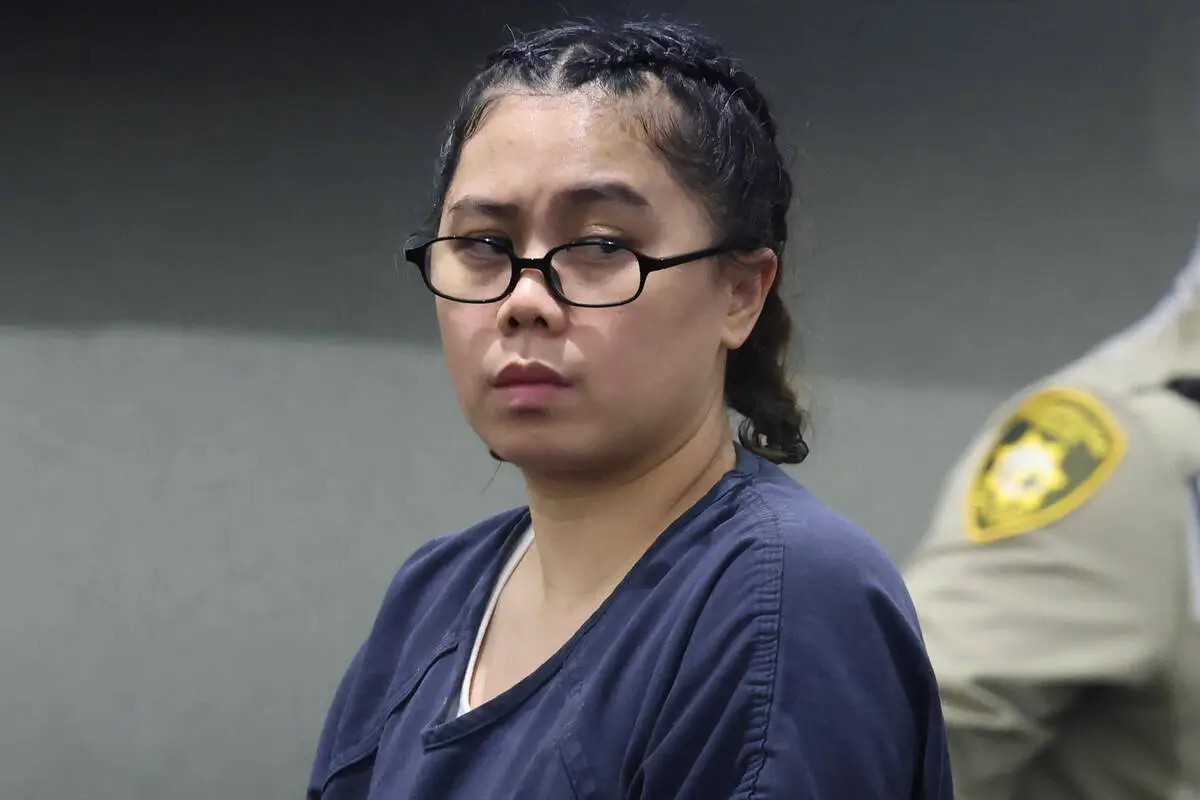 Jiaying Chen listens during her sentencing hearing in a Las Vegas courtroom