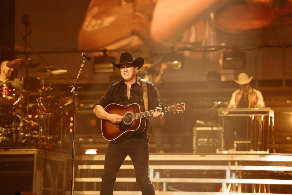 Jon Pardi on stage — five Gamblin' Man Tour shows are now postponed across two weekends.