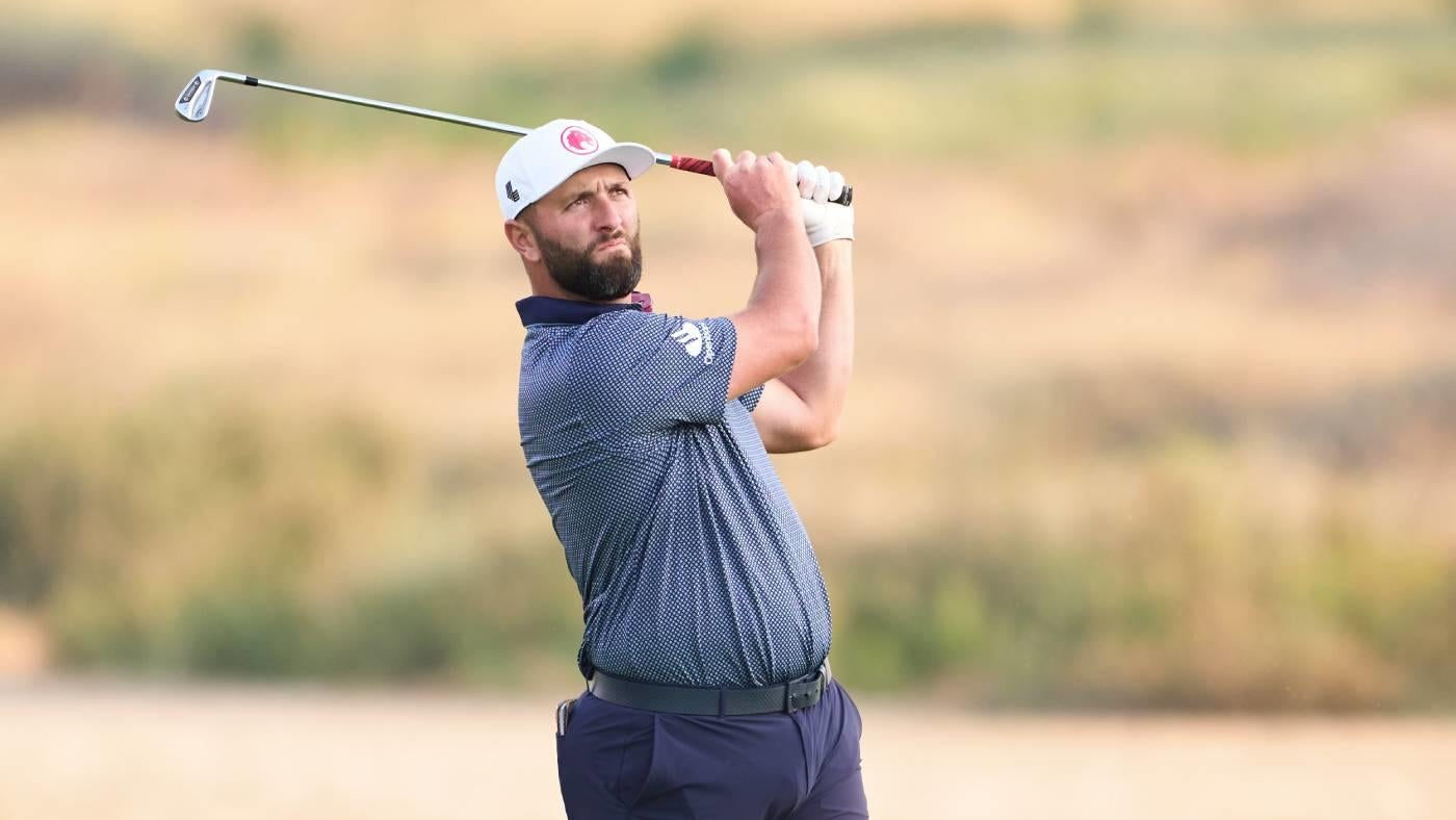 Jon Rahm competing on the golf course.