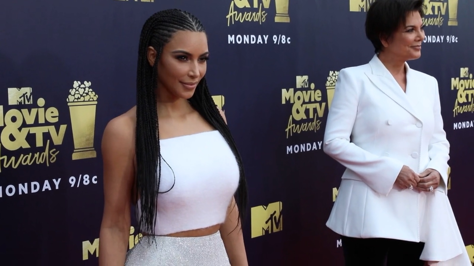 Kim Kardashian and Kris Jenner on a red carpet