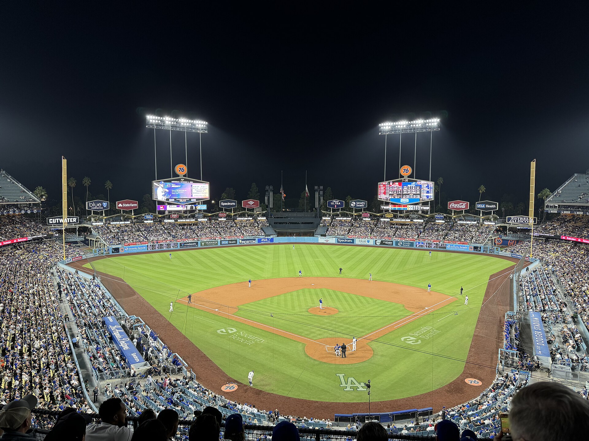 Dodger Stadium at night, packed for a game under the lights