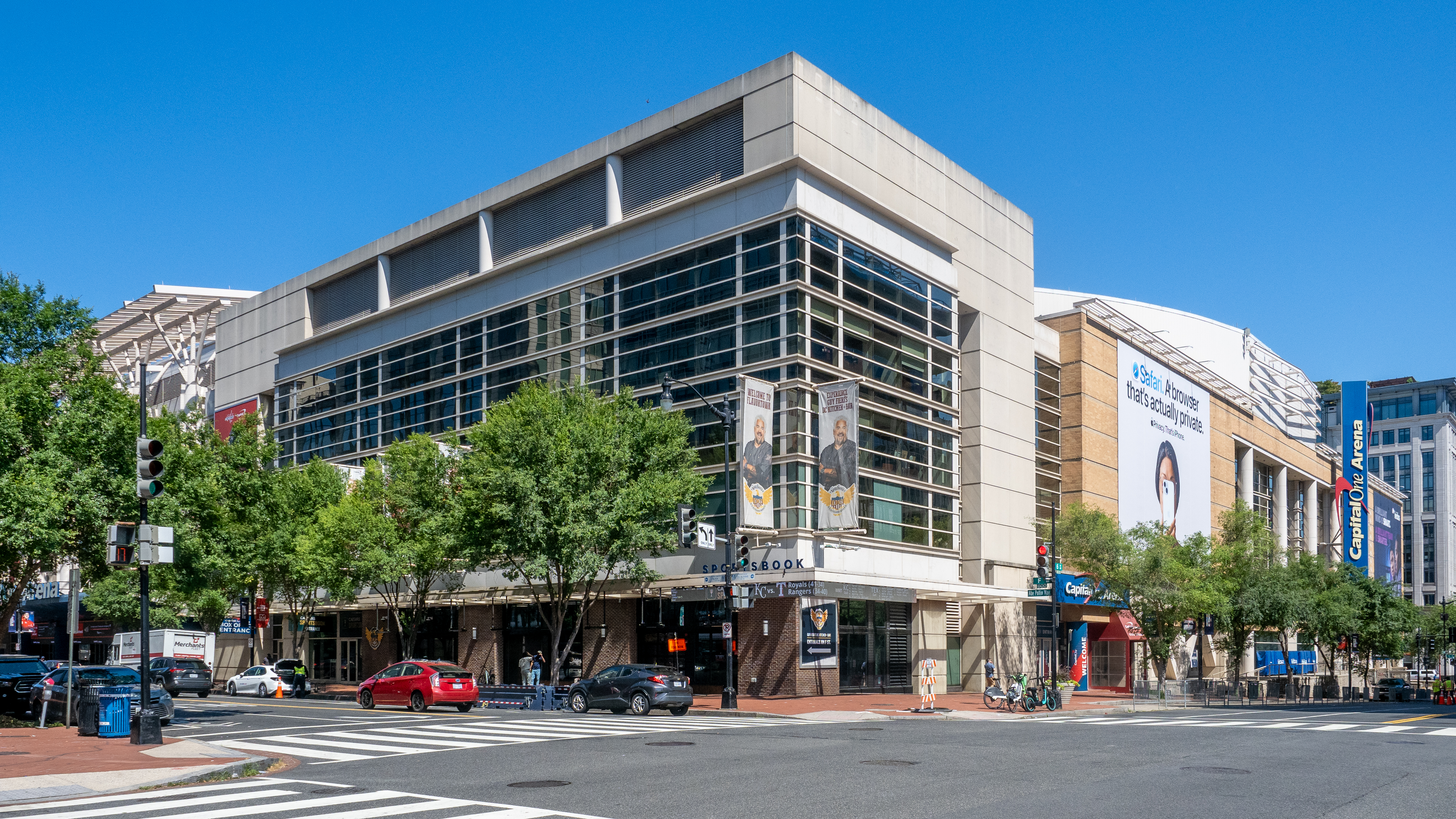 Capital One Arena in Washington, D.C., brightly lit on game day