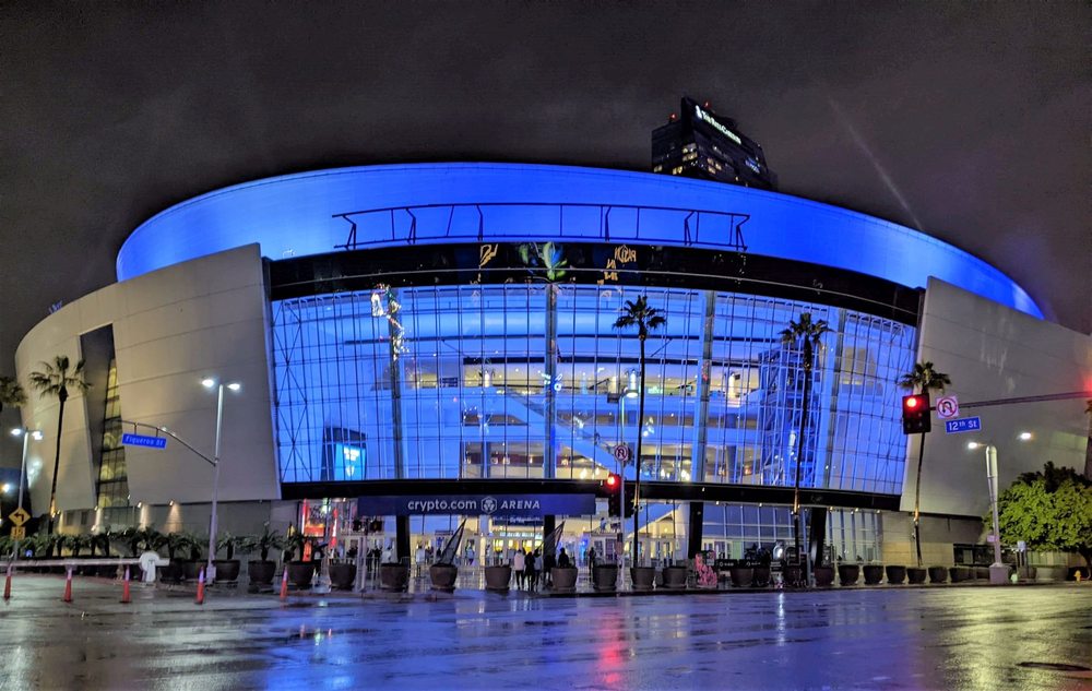 Crypto.com Arena lit up at night in downtown Los Angeles