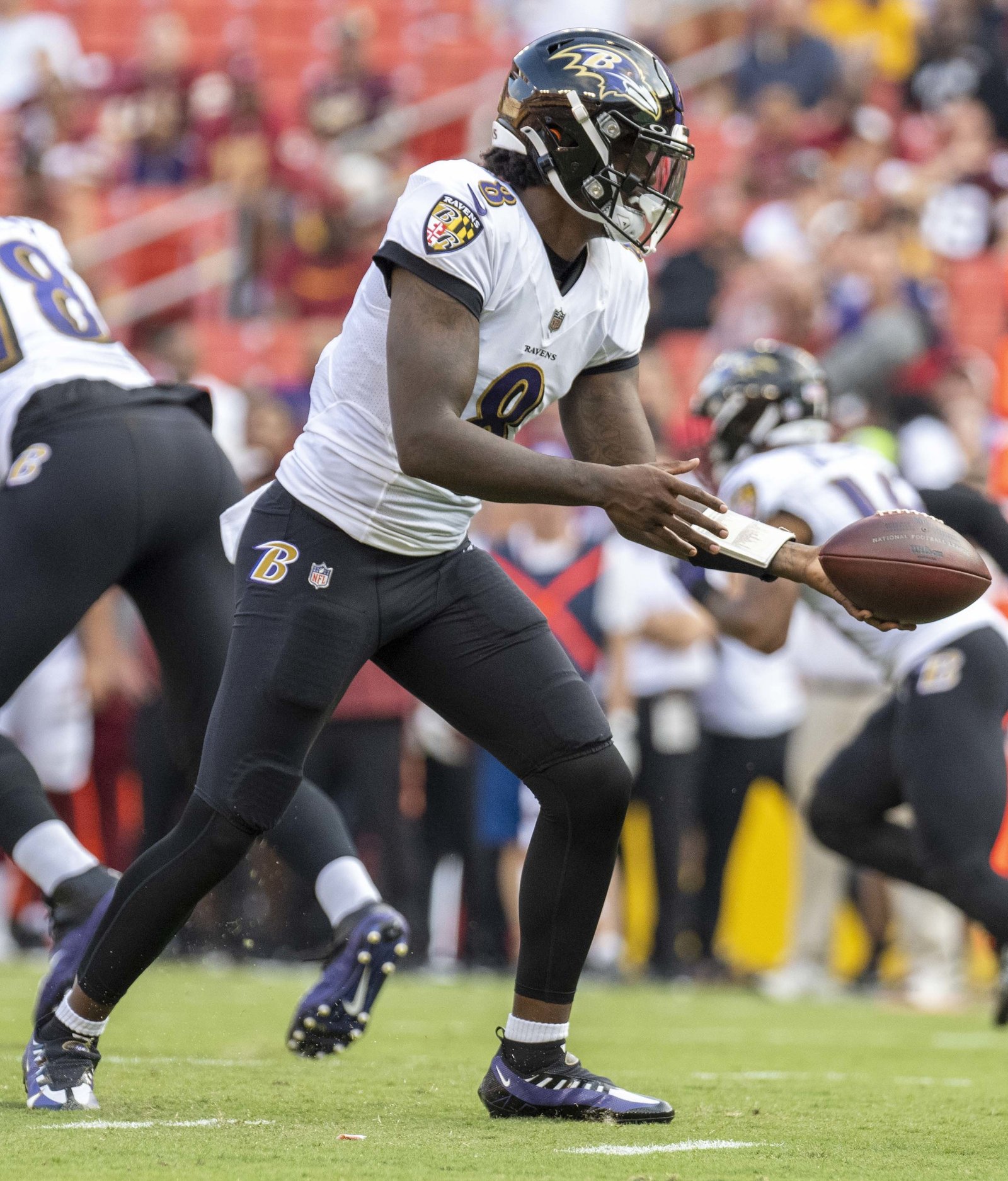 Ravens quarterback Lamar Jackson (8) in the white away uniform during a 2021 preseason game