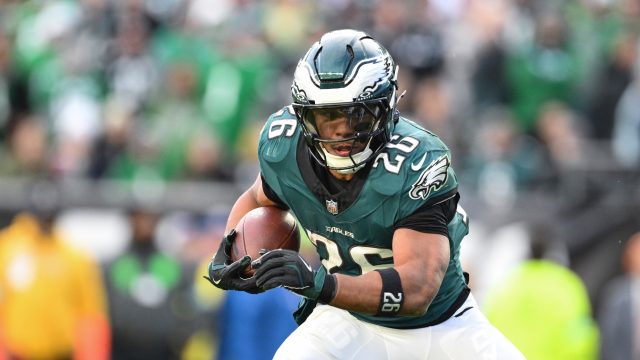Philadelphia Eagles running back Saquon Barkley carries the ball.