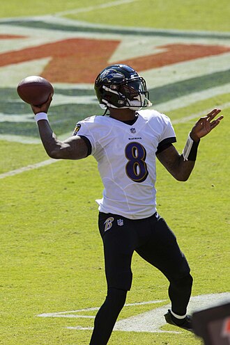 Lamar Jackson drops back to pass for the Baltimore Ravens.