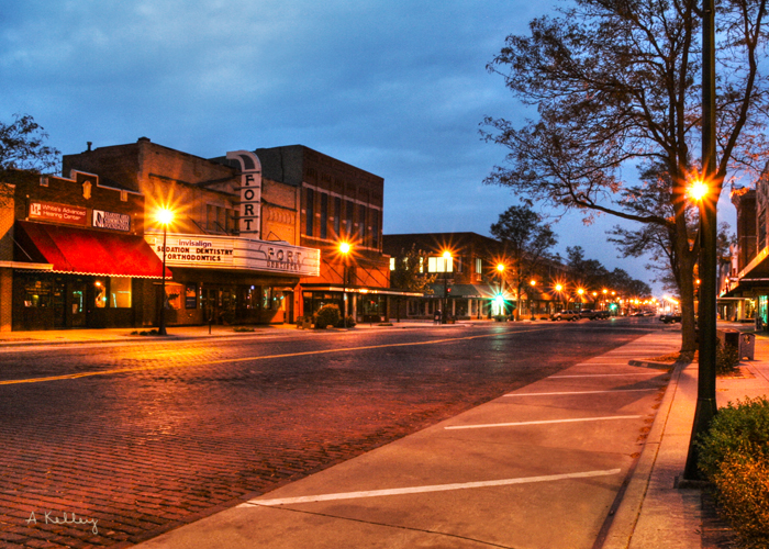 A small-town Nebraska main street at dusk