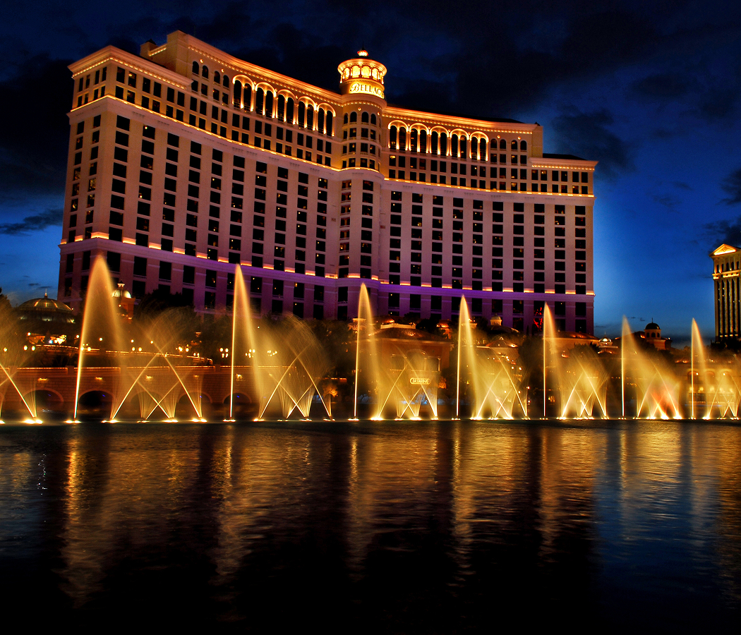 The Bellagio fountains dance on the Las Vegas Strip at dusk