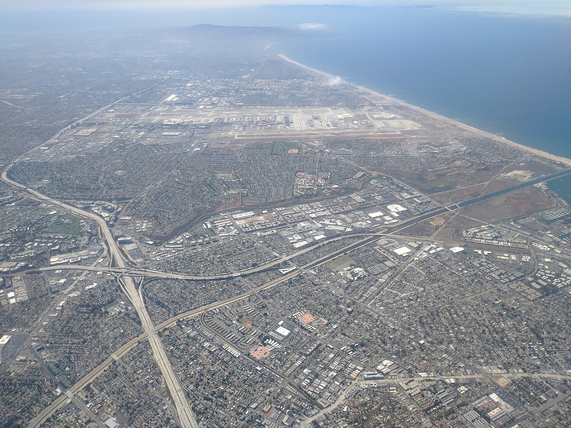 Aerial view of Los Angeles International Airport and the surrounding area on a bright day