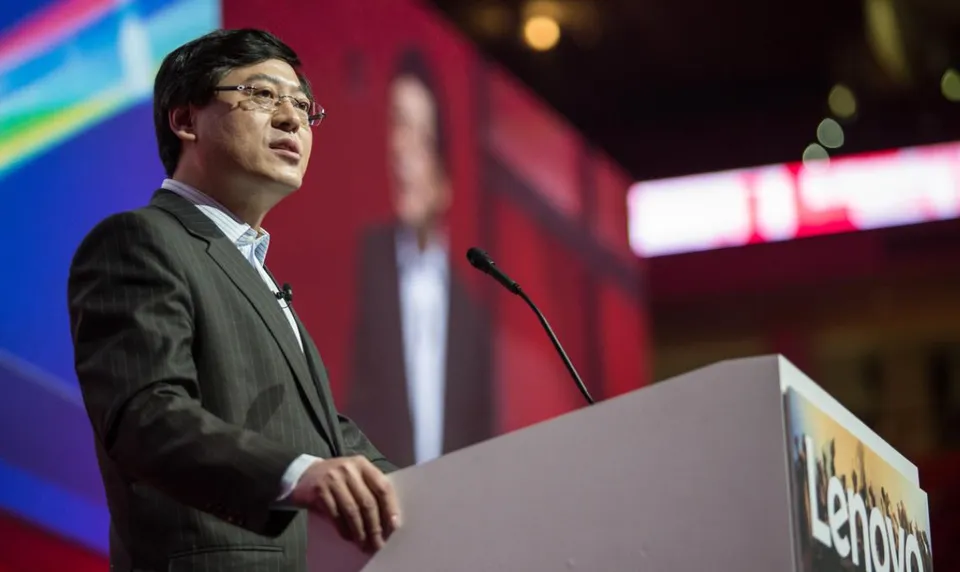 Lenovo chairman and CEO Yuanqing Yang speaking at a Lenovo event podium