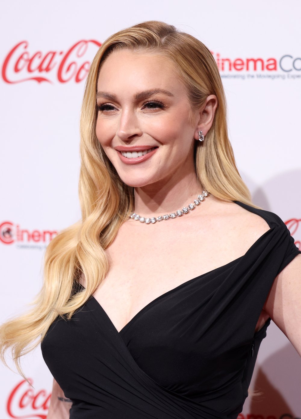 Lindsay Lohan smiling at a public appearance