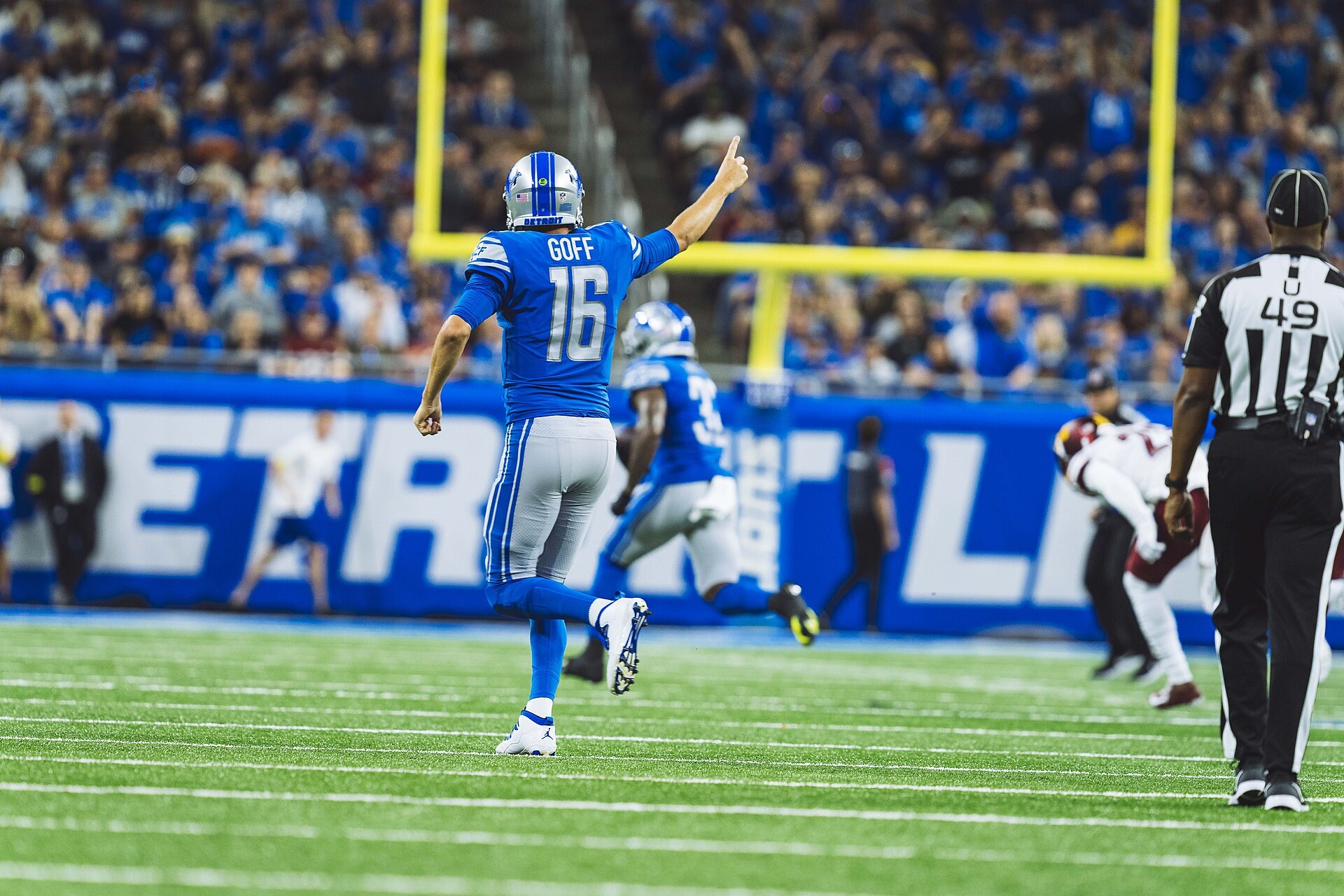 Detroit Lions quarterback Jared Goff on the field at Ford Field in his blue Lions uniform