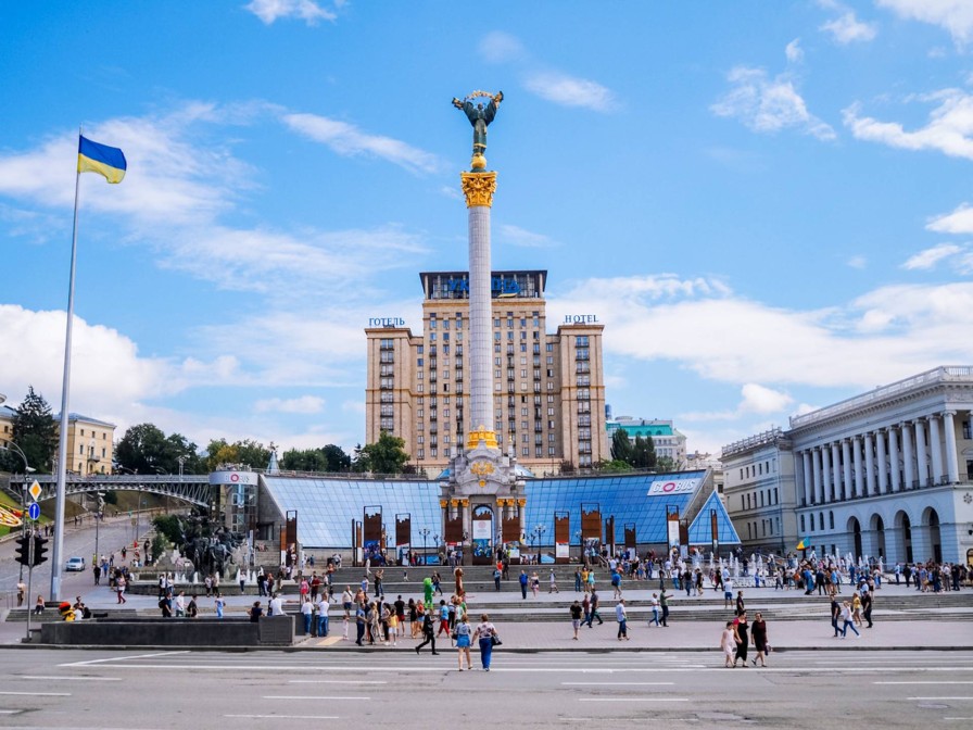 Independence Square in Kyiv with the Ukrainian flag and the Independence Monument