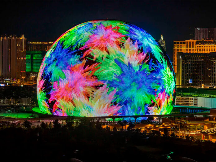 The Sphere glowing at night on the Las Vegas Strip