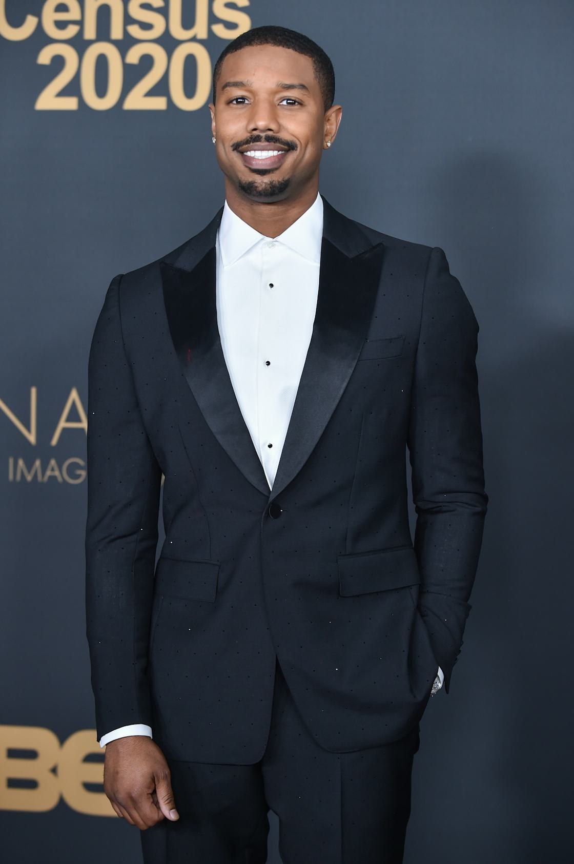 Michael B. Jordan smiling at a premiere