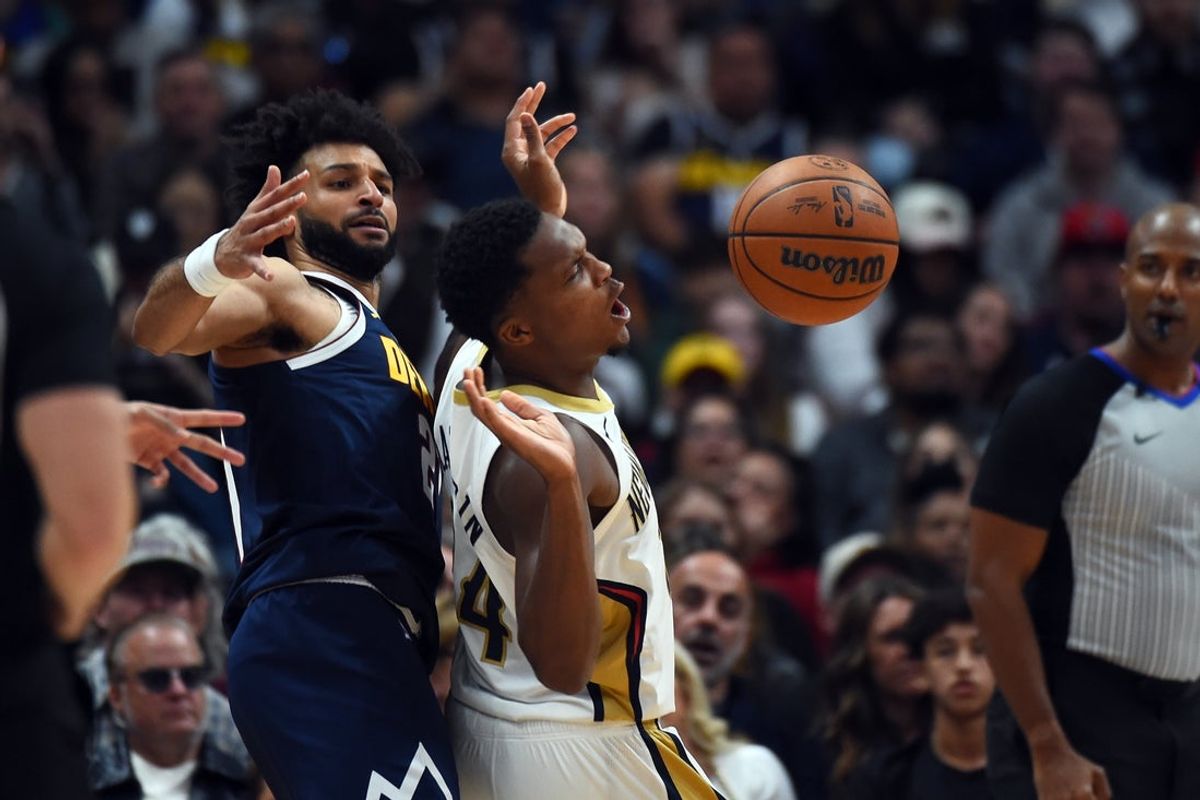 Jamal Murray of the Denver Nuggets knocks the ball away from Bennedict Mathurin of the New Orleans Pelicans during the first half at Ball Arena in Denver on October 24, 2026