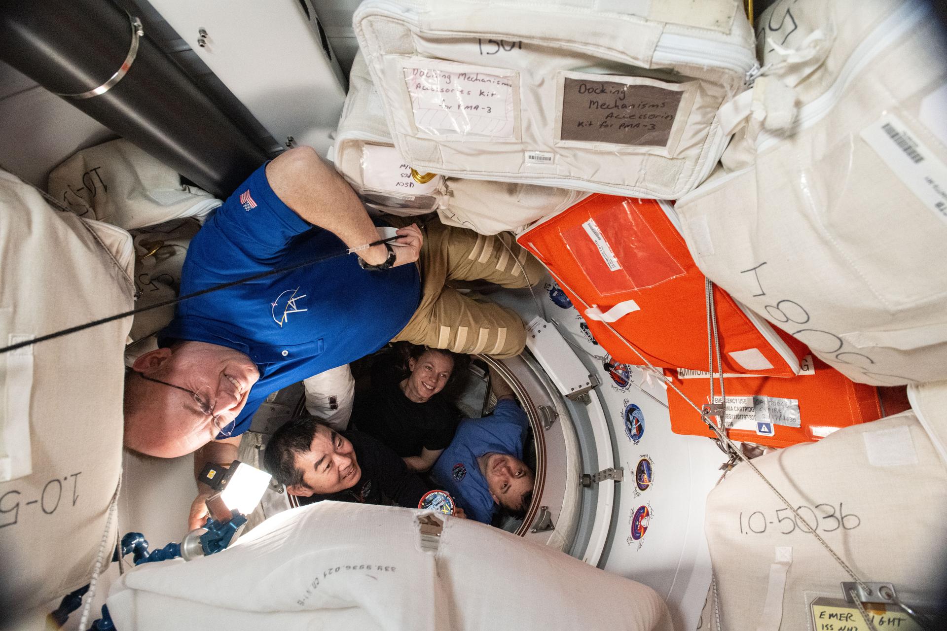 Astronauts boarding a SpaceX Dragon capsule