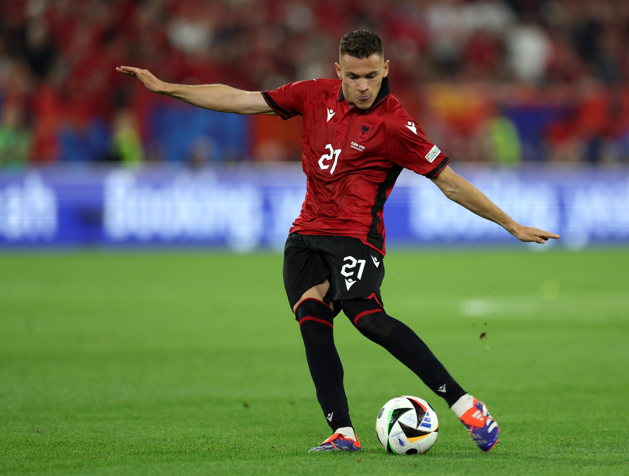 Kristjan Asllani in the Albania shirt