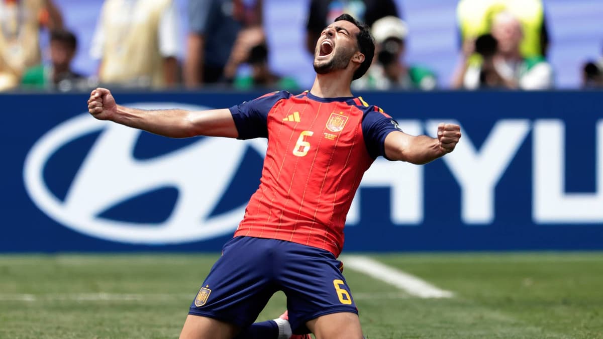 Mikel Merino celebrating in the Spain shirt