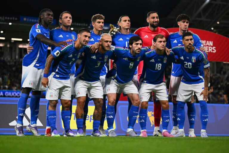 Italy's starting XI lines up ahead of a 2026 FIFA World Cup qualifying match.