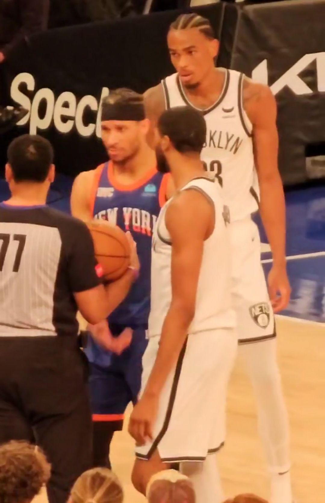 New York Knicks players in action against the Brooklyn Nets