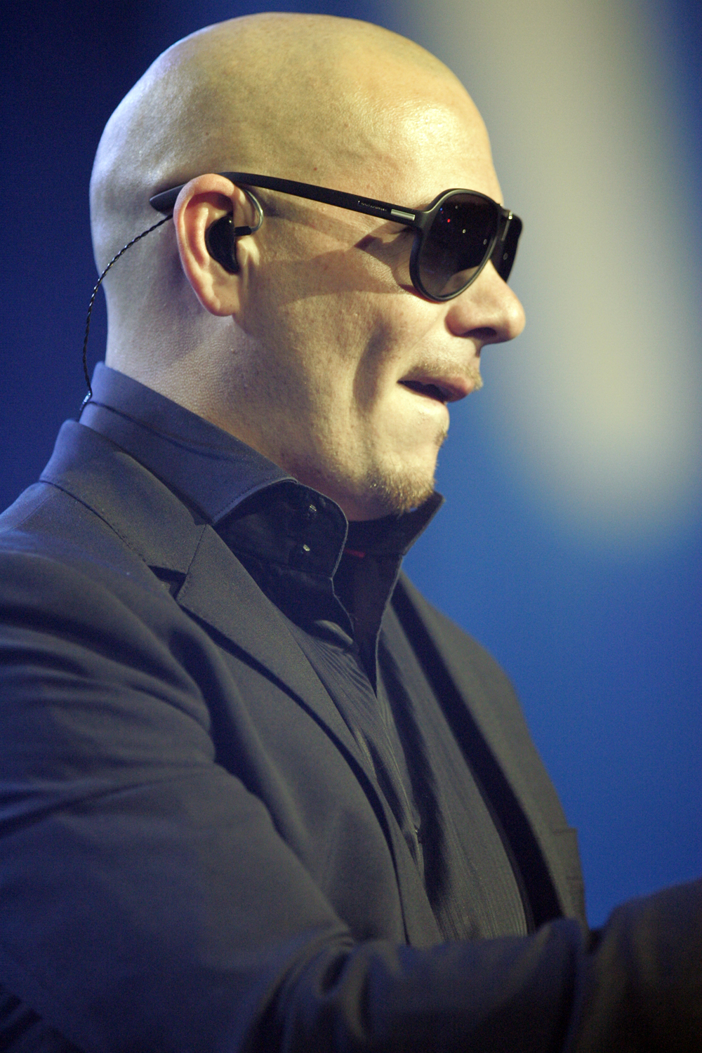 Pitbull performing on stage — his 13th studio album Pitcoin led October 9's releases