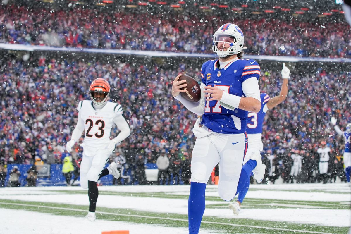 Buffalo Bills quarterback Josh Allen running with the football
