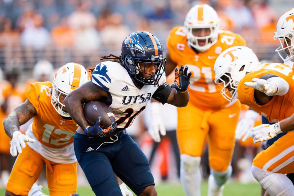 A UTSA running back breaking through the Tennessee defense