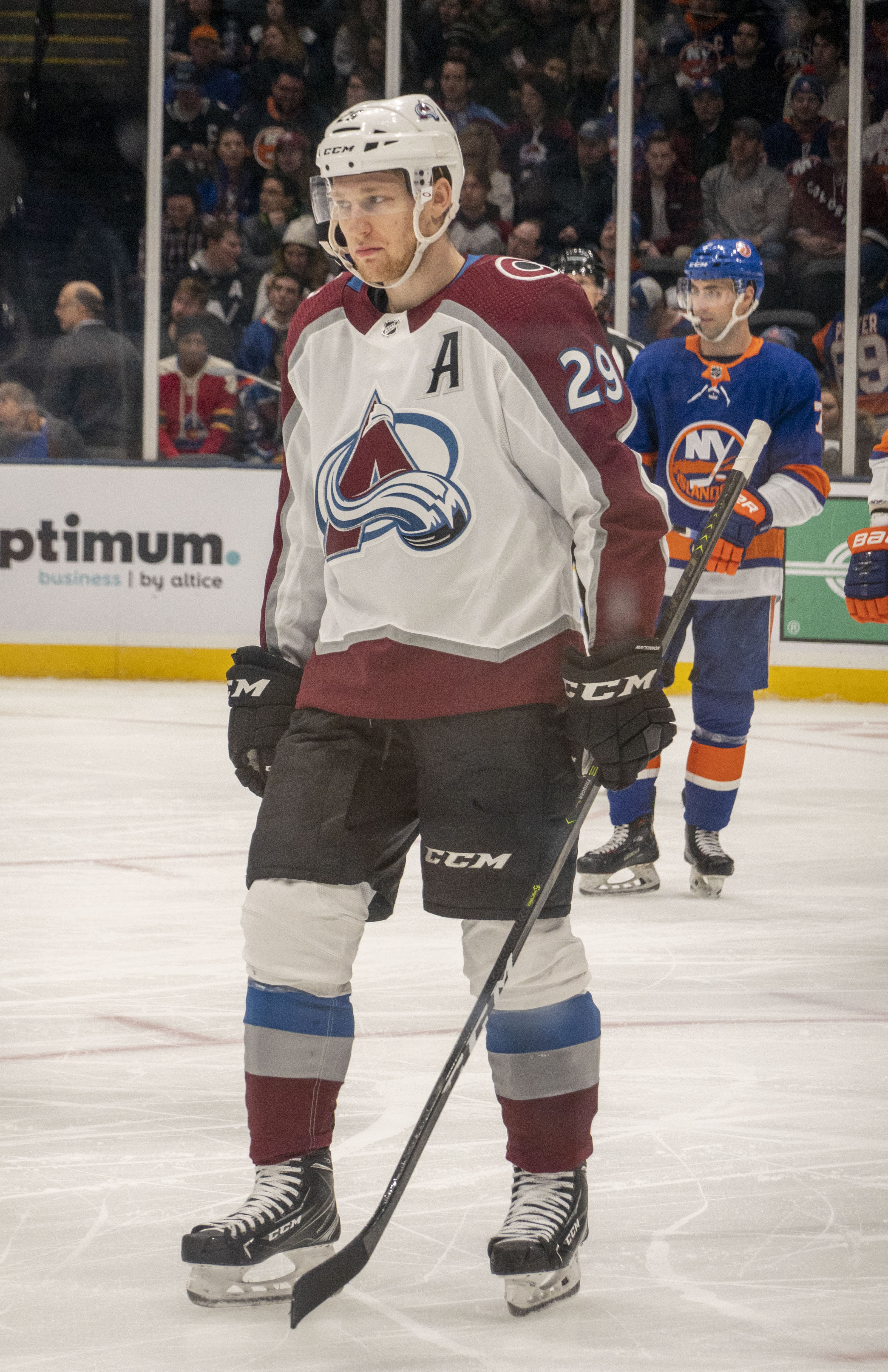 Nathan MacKinnon in a Colorado Avalanche uniform on the ice