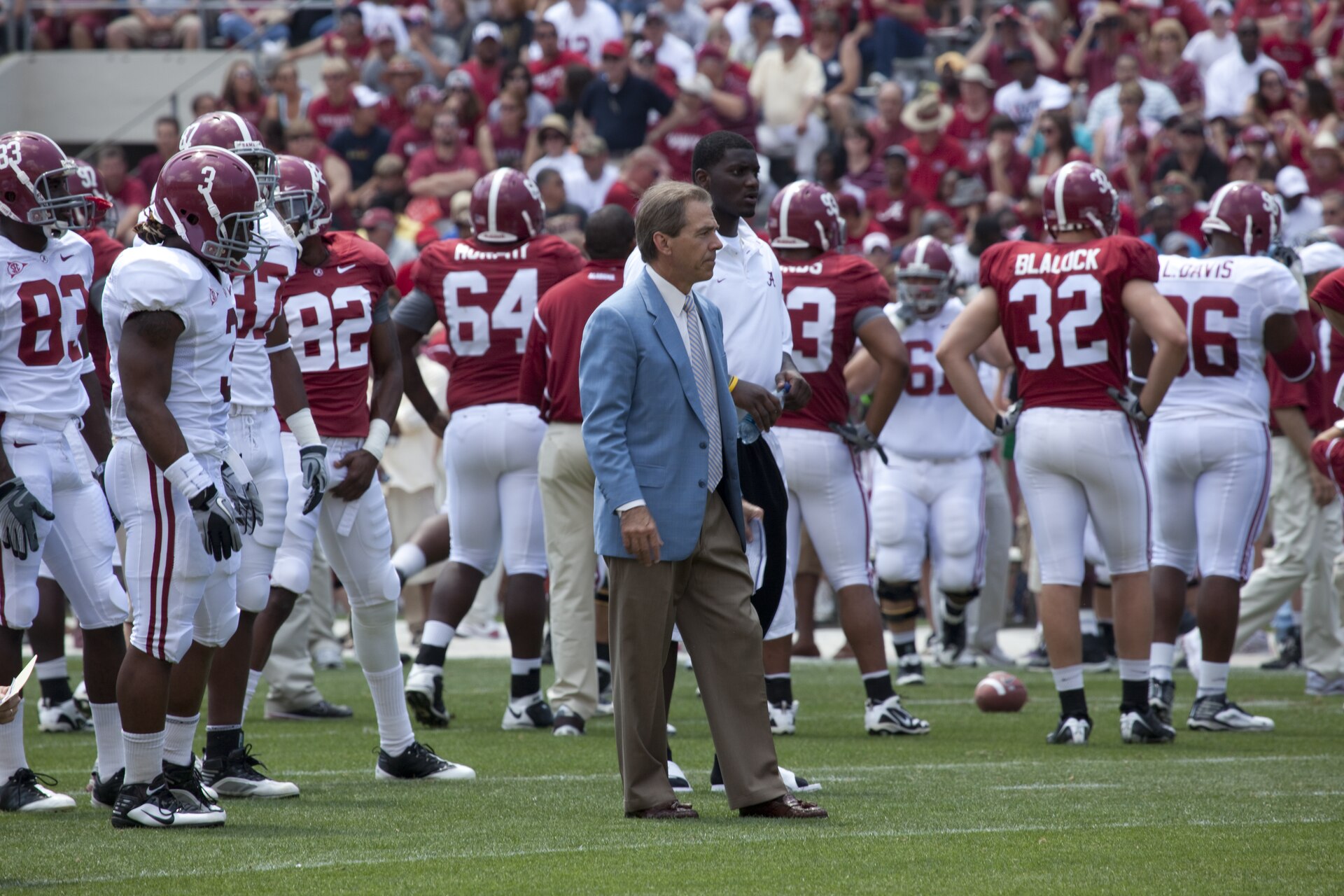 Nick Saban on the Alabama sideline analyzing an A-Day spring scrimmage in Tuscaloosa
